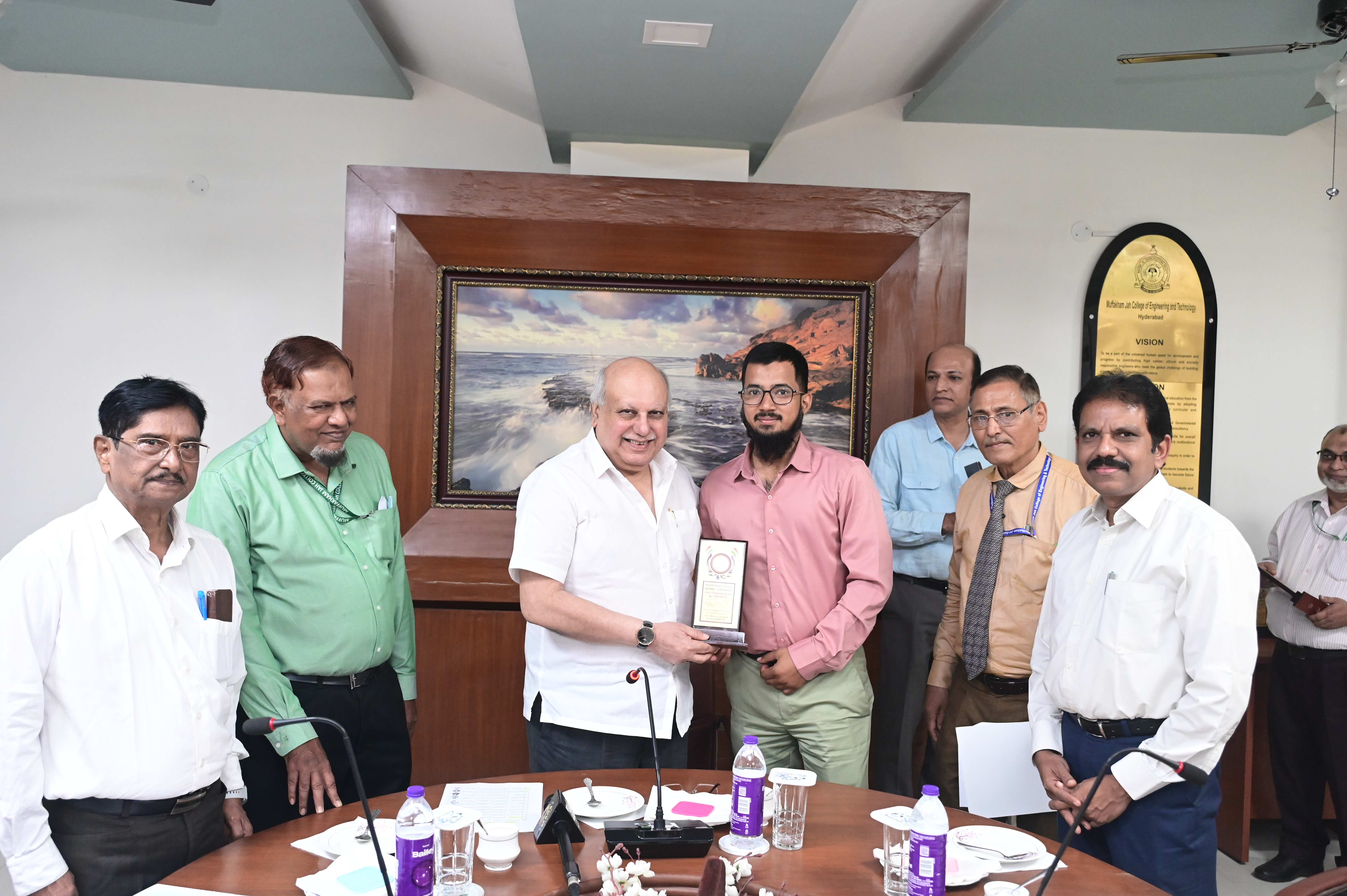 Mr. Syed Khader Ahmed, TPBO receiving memento from Hon. Secretary Janab Zafar Javeed, SUES